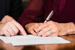 Elderly woman receiving help with Estate Planning in Peoria IL