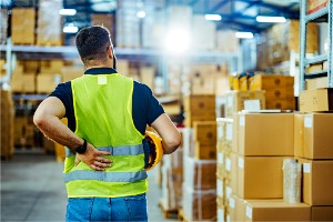 A warehouse worker has back pain from an on-the-job injury and needs to call a Workers Compensation Attorney in East Peoria IL